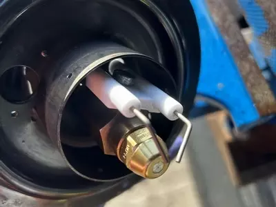 New Burner Nozzle And Electrodes After Service